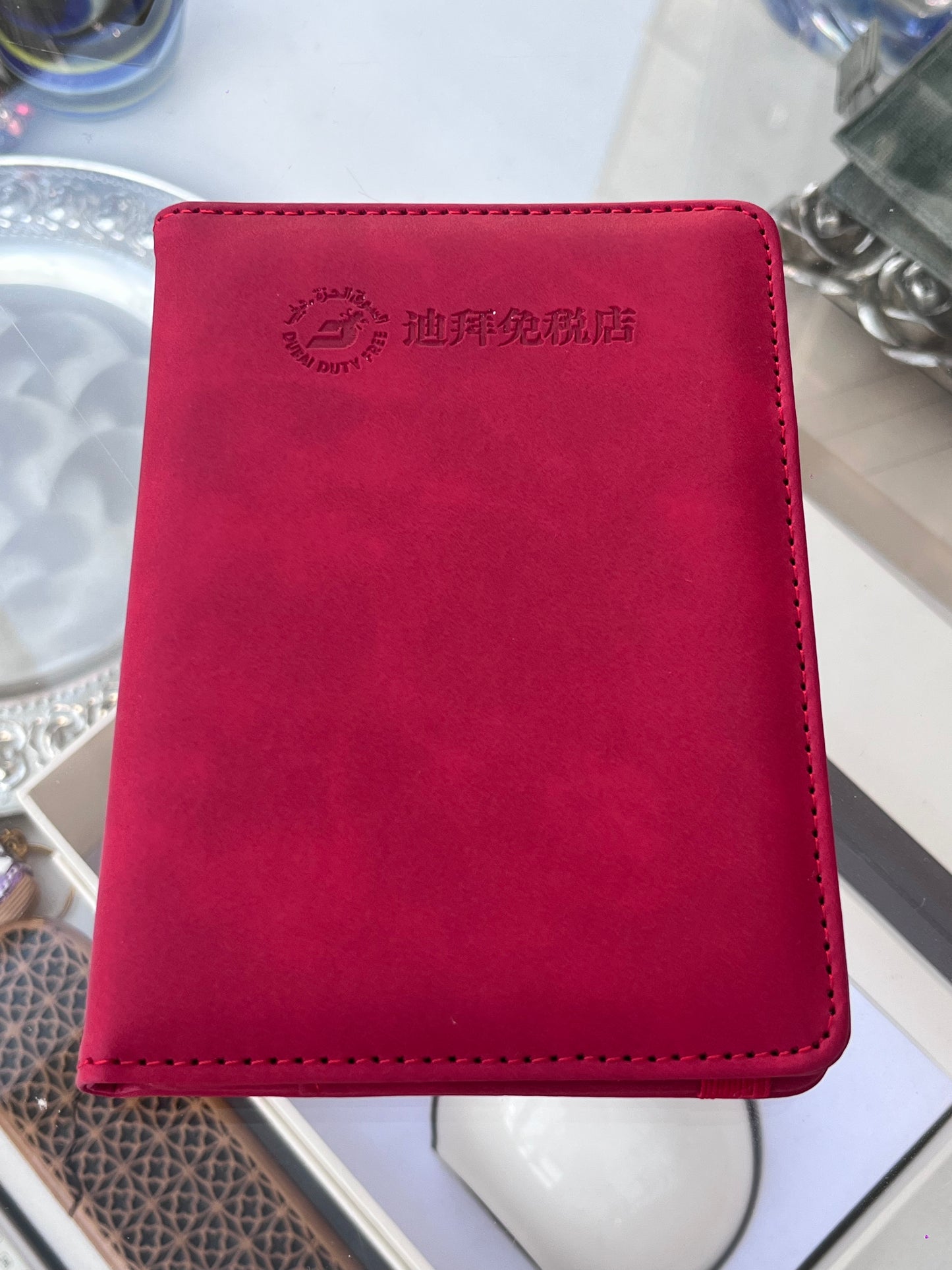 DUTYFREE RED PASSPORT HOLDER TRAVEL WALLET WITH SIM CARD STORAGE ELASTIC CLOSURE