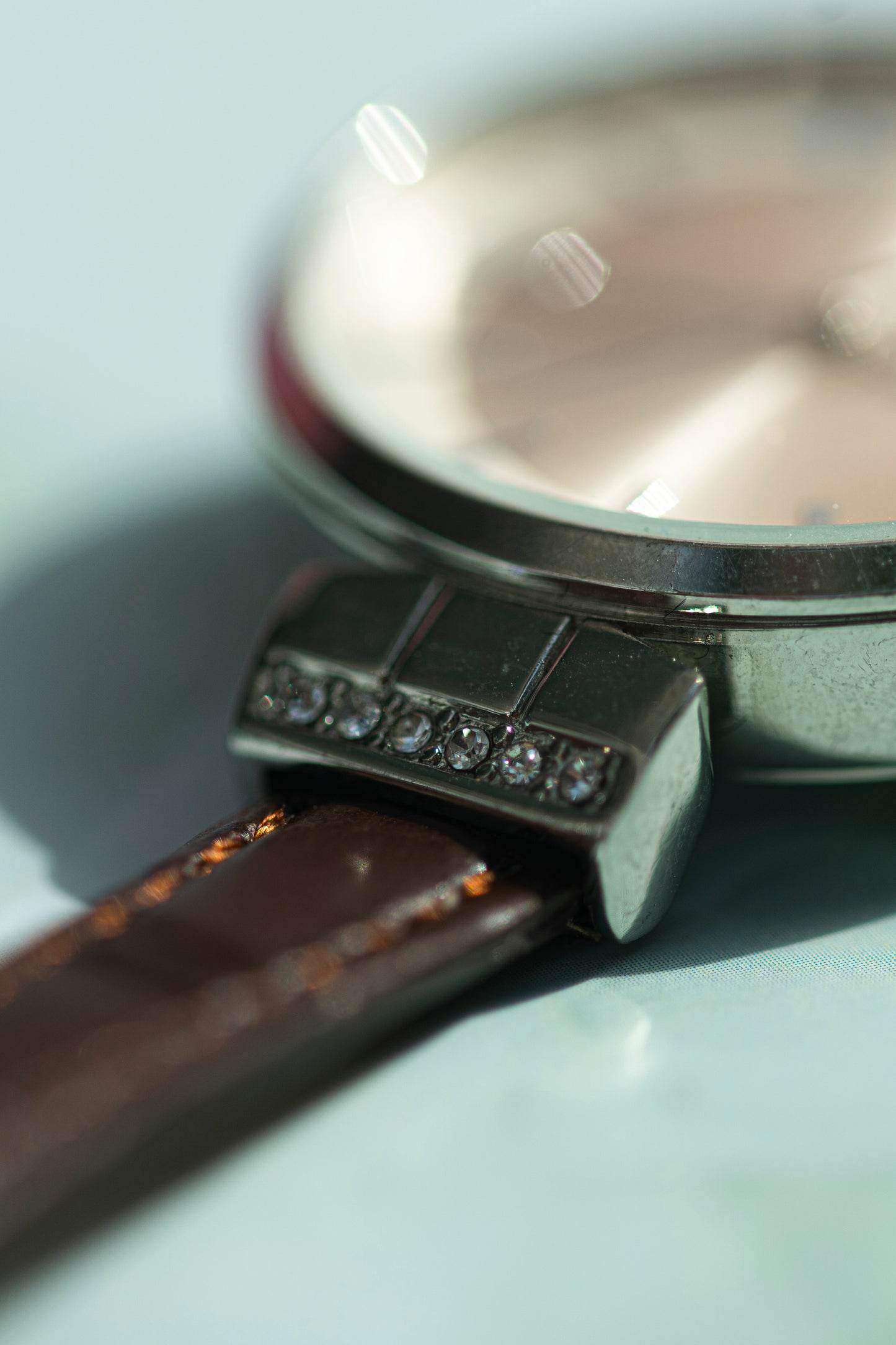 CRYSTAL ACCENT STEEL QUARTZ FASHION WATCH