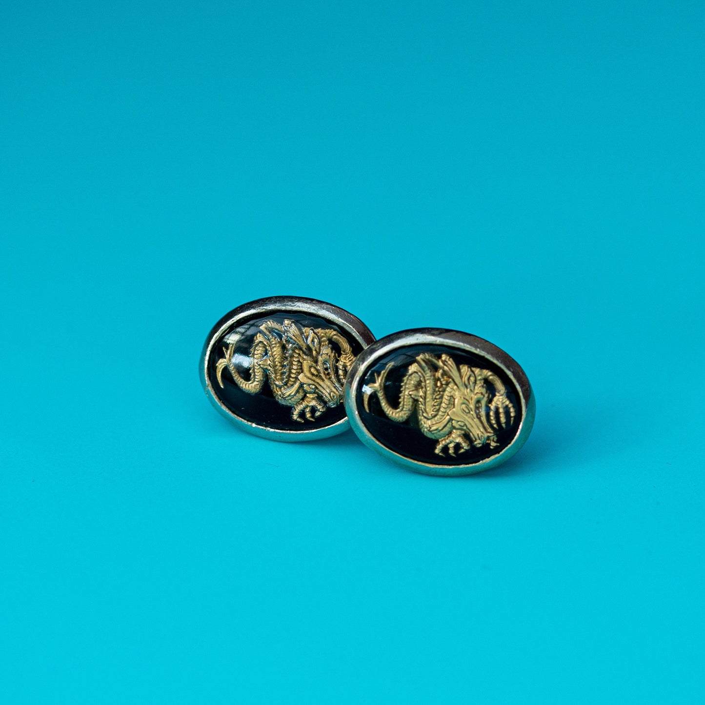 VINTAGE GOLD-TONE DRAGON OVAL BLACK ENAMEL CUFFLINKS