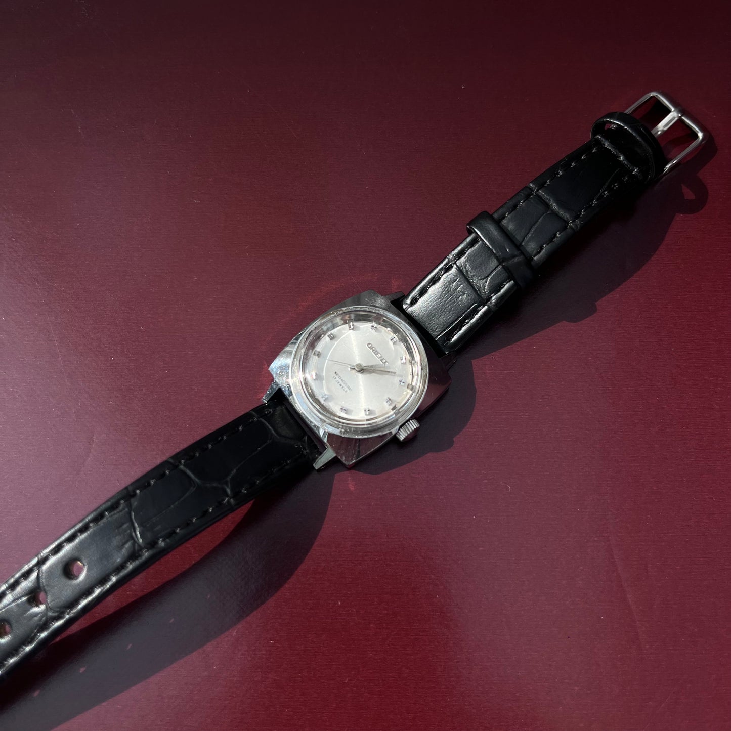 ORIENT 1980S SILVER DIAL STEEL CASE 1980S BLACK STRAP PRELOVED WATCH