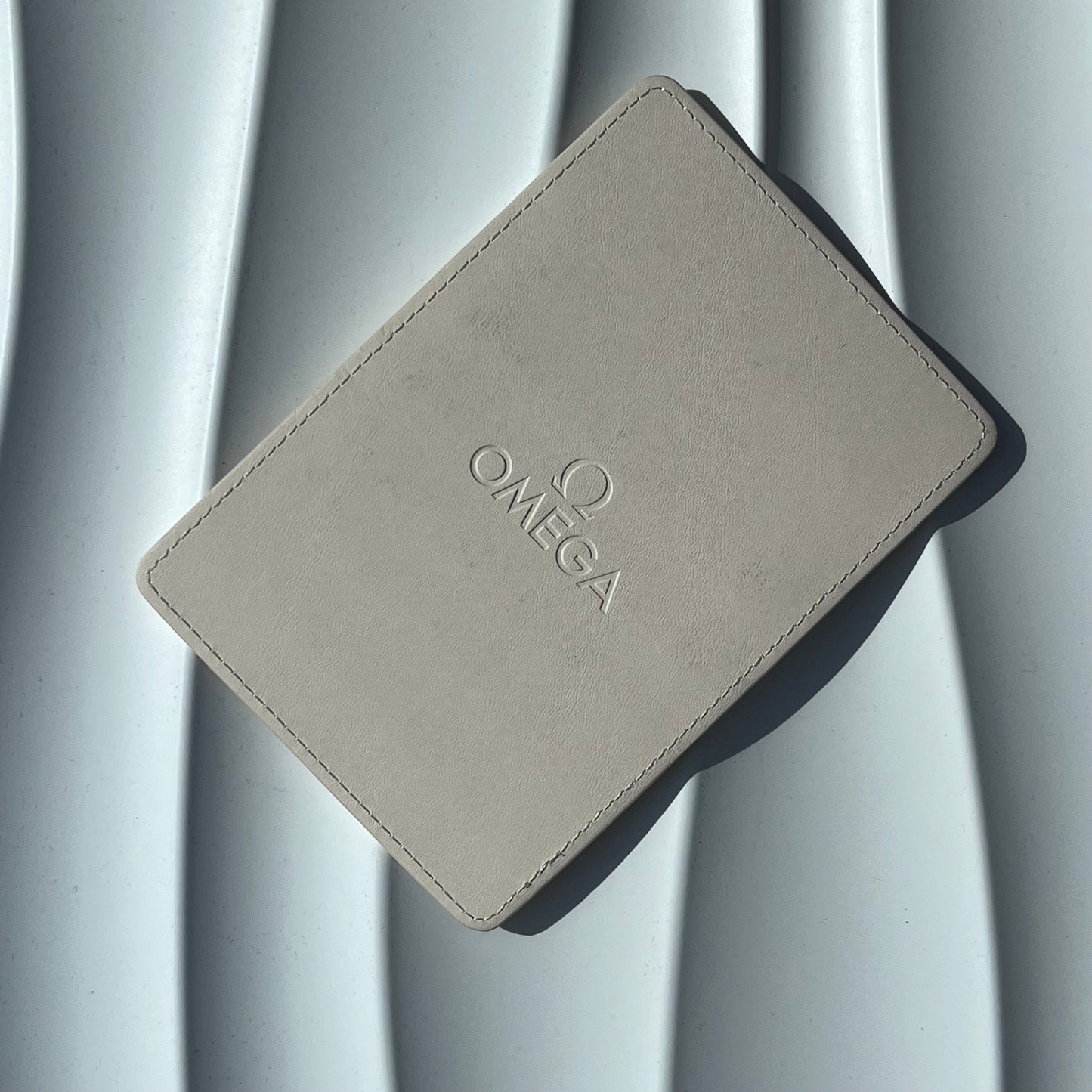 OMEGA WHITE LEATHER CARD HOLDER WITH 8 CARD SLOTS PRE-LOVED