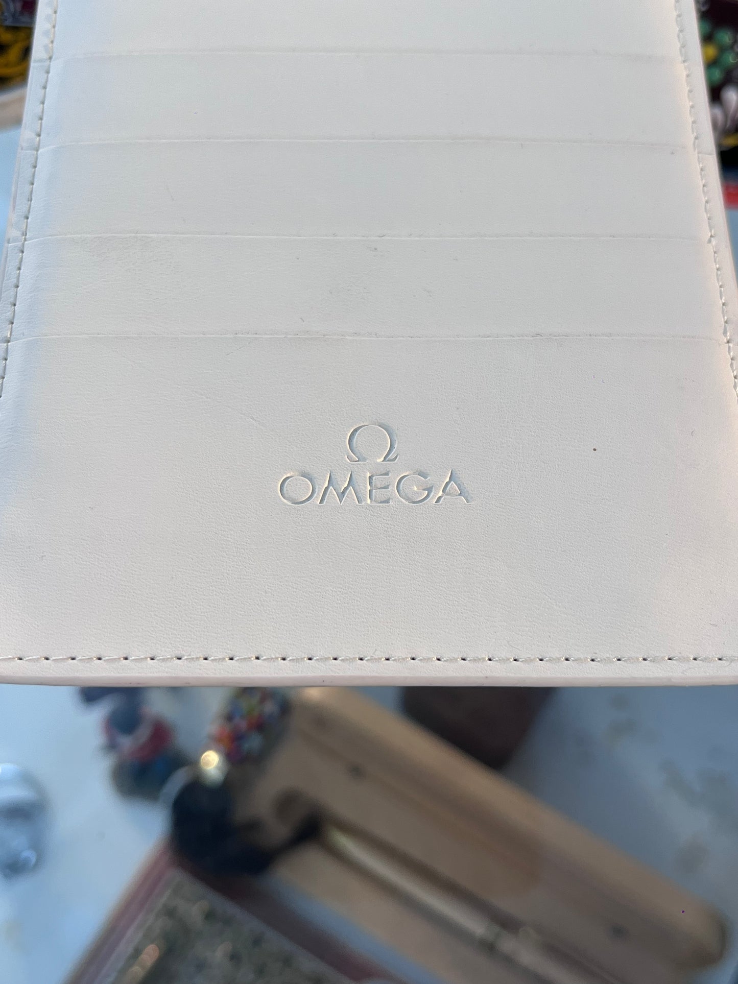 OMEGA WHITE LEATHER CARD HOLDER WITH 8 CARD SLOTS PRE-LOVED