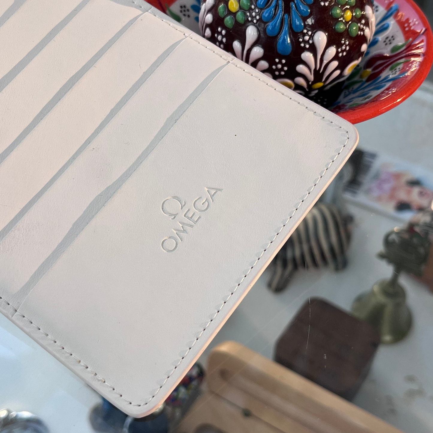 OMEGA WHITE LEATHER CARD HOLDER WITH 8 CARD SLOTS PRE-LOVED