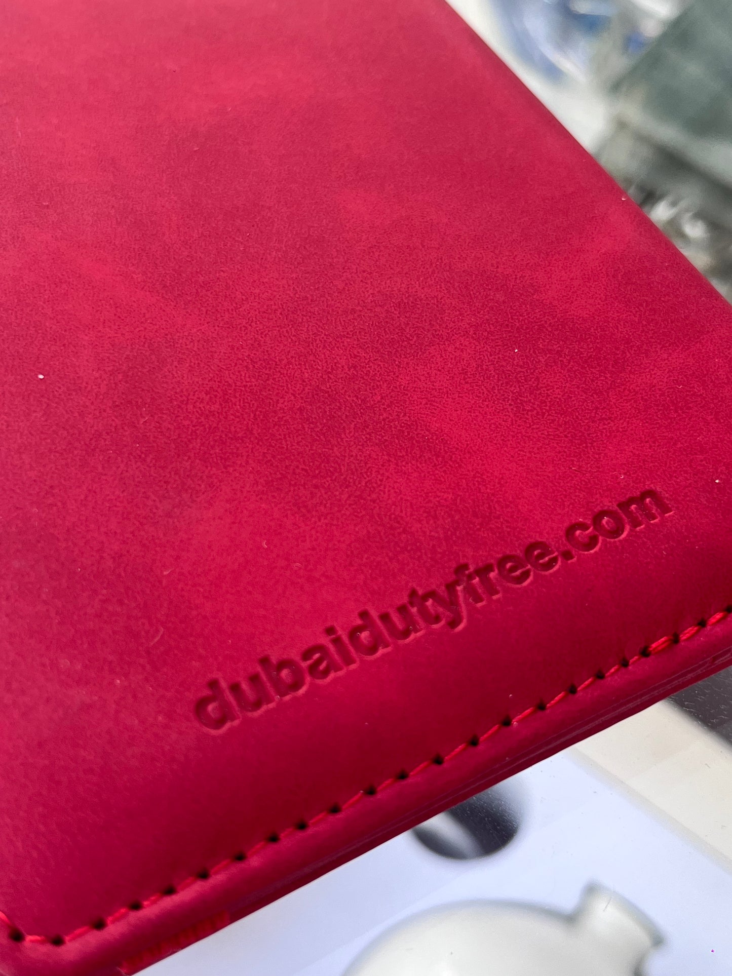 DUTYFREE RED PASSPORT HOLDER TRAVEL WALLET WITH SIM CARD STORAGE ELASTIC CLOSURE