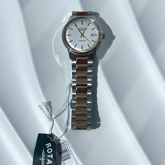Watch with wooden strap and Rotary tag on a white background